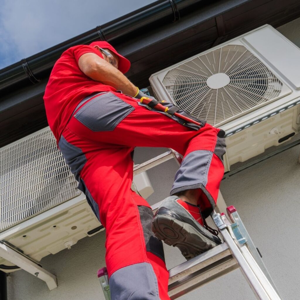 Professional HVAC Technician Installing a New Air Conditioner in Gilbert, Arizona