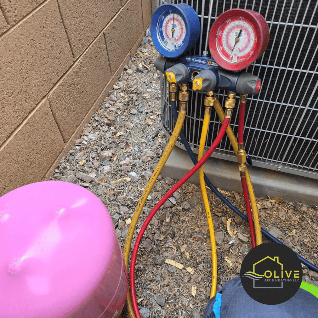 AC repair: Technician inspecting an AC unit in Gilbert that’s not cooling properly.