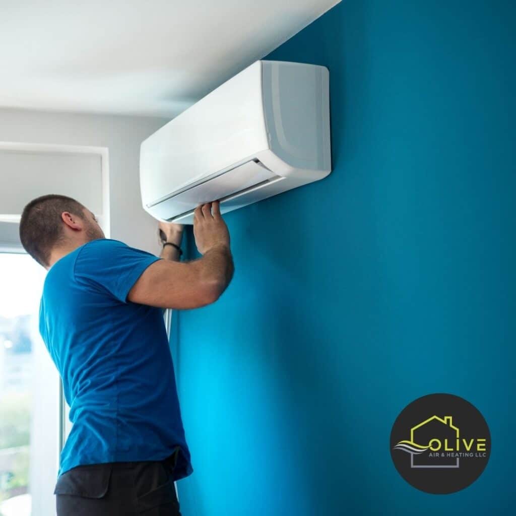 AC technician securing a new air conditioning system during installation in Tempe