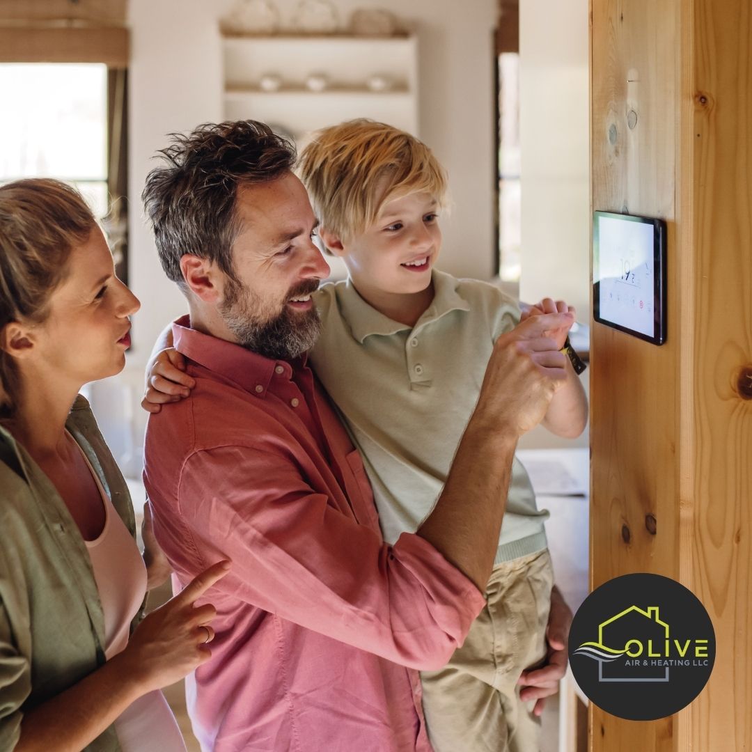 A homeowner in San Tan Valley, AZ, adjusting the settings on a smart thermostat to optimize comfort and energy use.