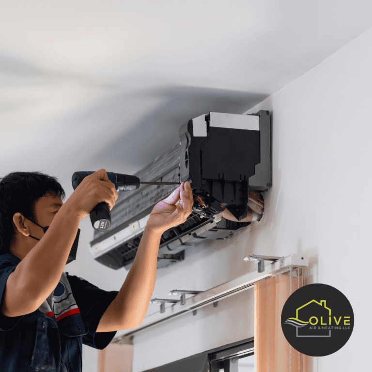 Air Conditioning Repair: HVAC technician inspecting AC electrical connections.