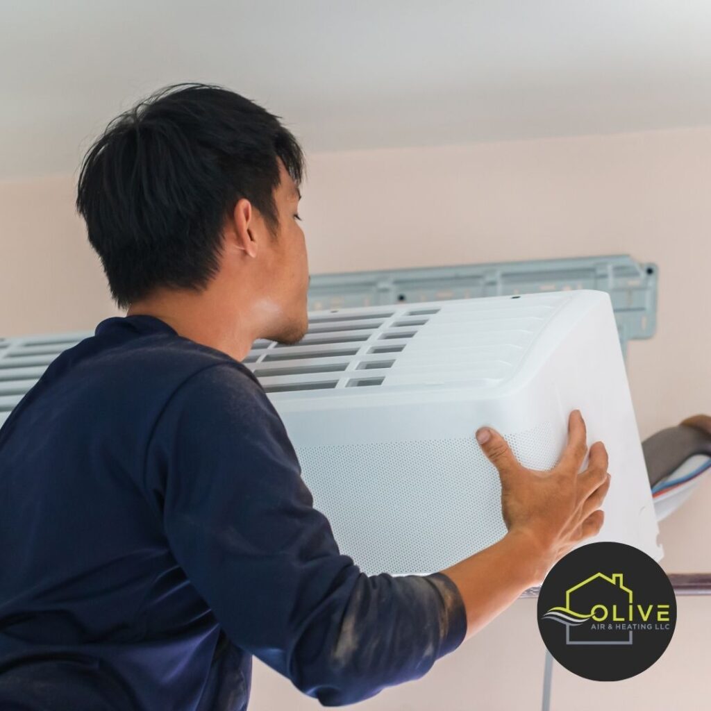 AC technician setting up a new air conditioning system in San Tan Valley