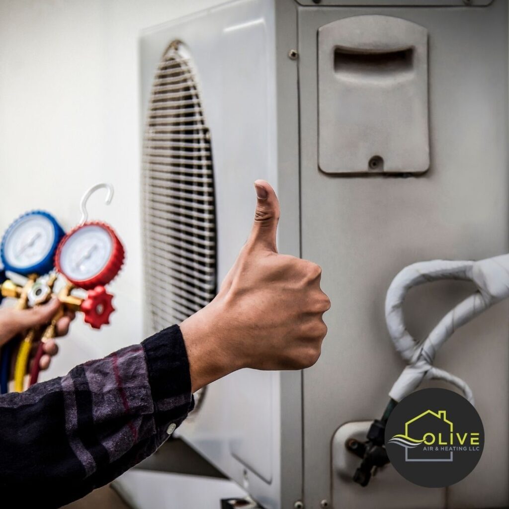 An air conditioning unit being serviced during an AC Tune-Up in San Tan Valley, with tools and an HVAC technician in view.