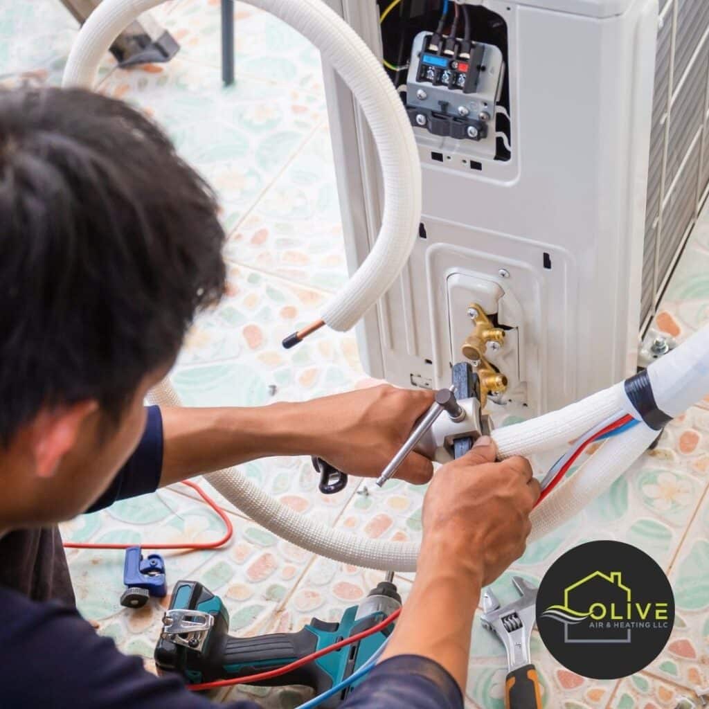 Technician performing AC installation on a rooftop unit in Queen Creek AZ