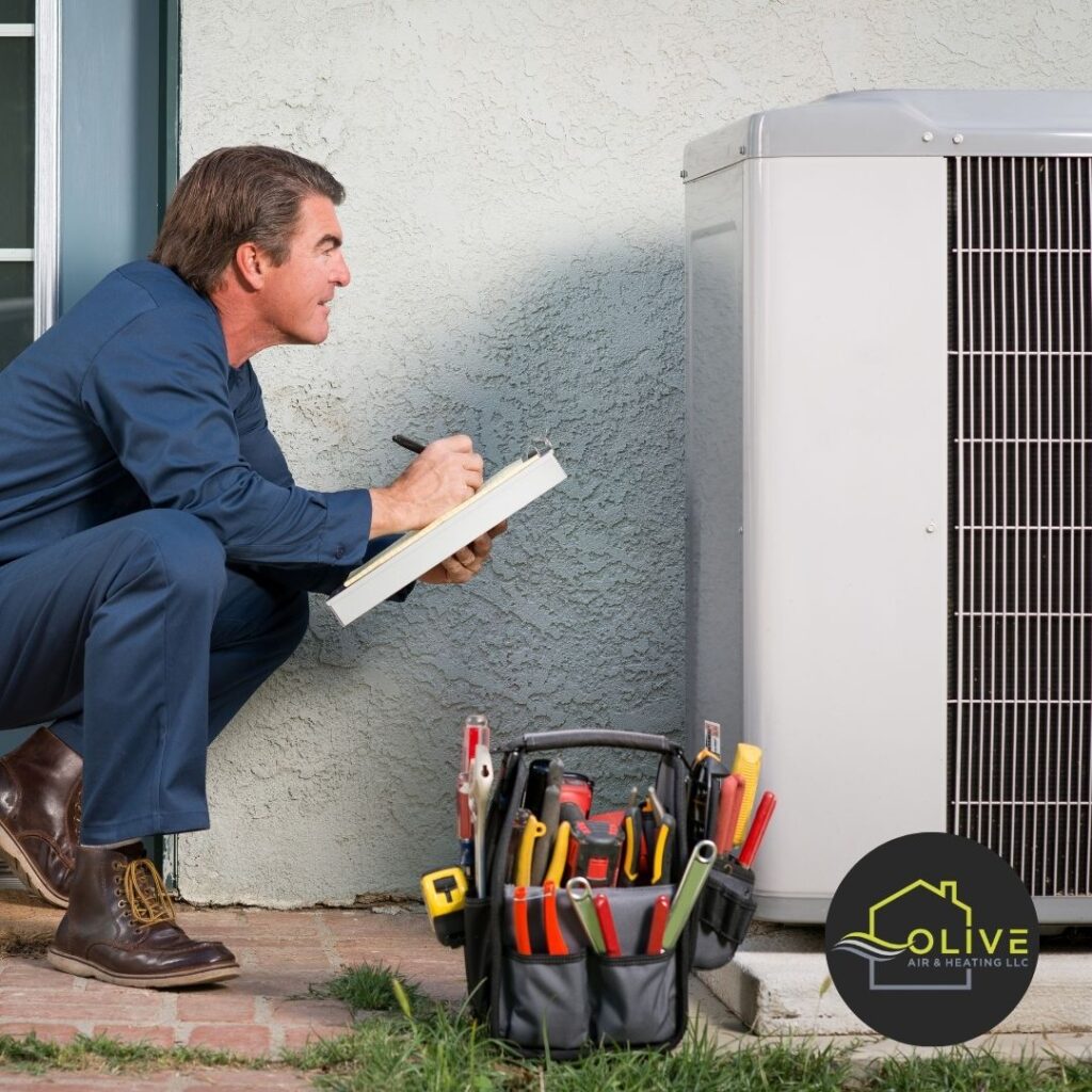 Technician performing AC & Heating Tune-ups in Gilbert, AZ