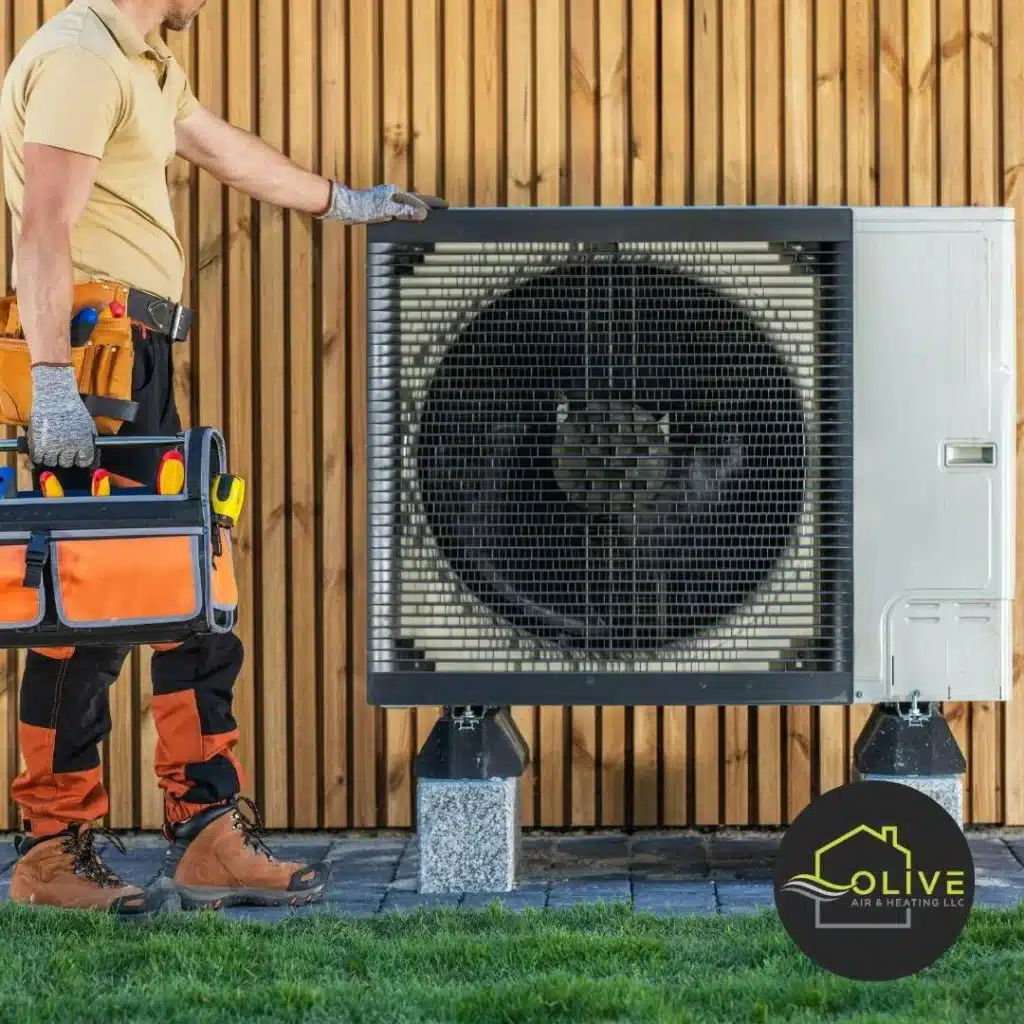 HVAC Technician Standing by Air Conditioning Unit Preparing For Maintenance. HVAC Repair Near Me