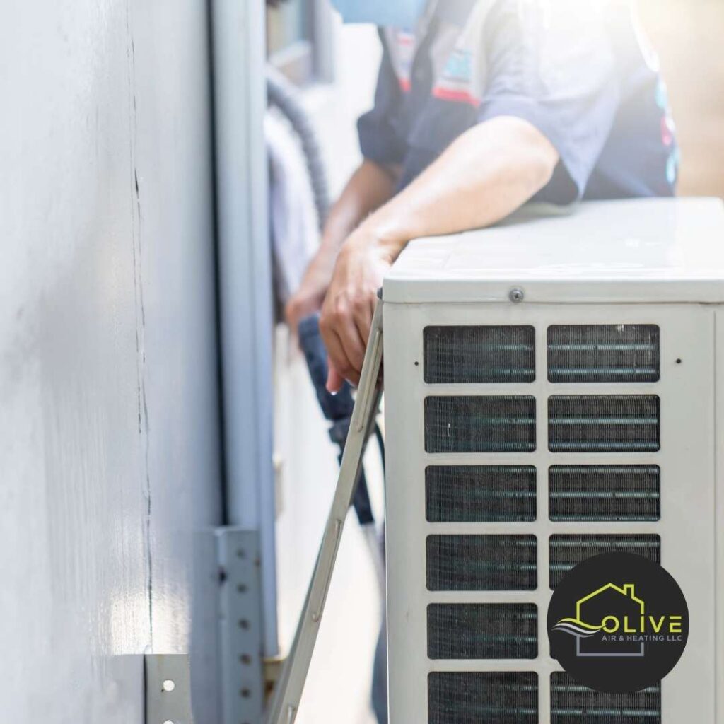 Expert technician setting up ductwork during HVAC installation in a new home