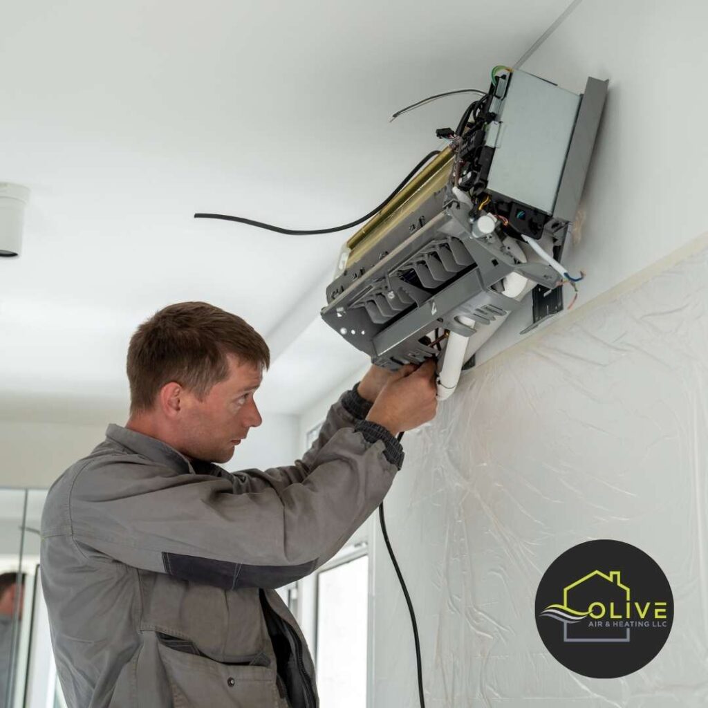 AC Repair expert fixing frozen coils in air conditioning unit