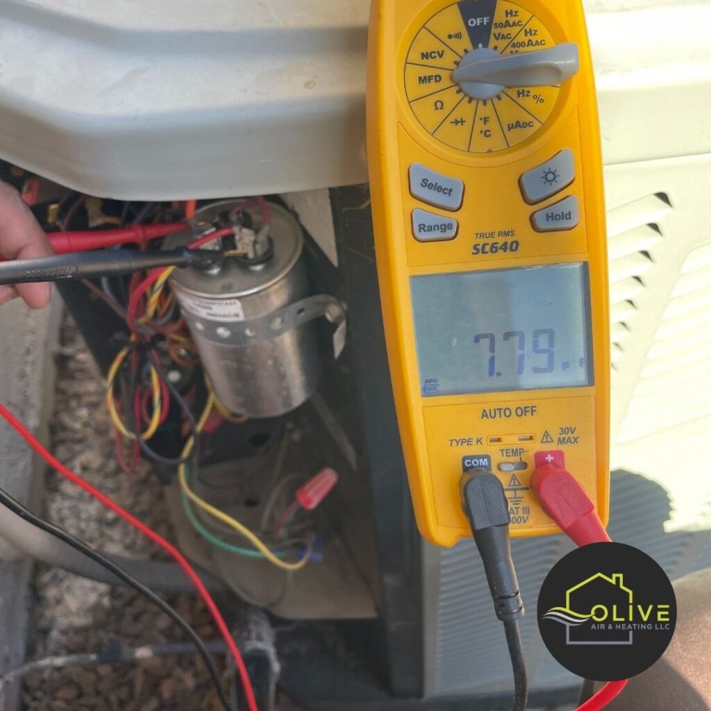 A technician using a digital multimeter to diagnose a heating system, ensuring accurate troubleshooting and cost-effective repairs. Heating repair