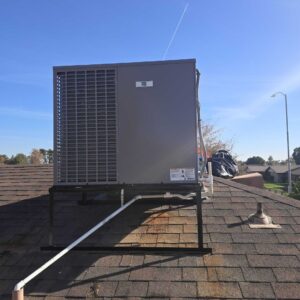 HVAC Technician Performing AC Maintenance in a Sun City West Home