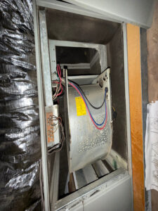 A close-up of an air conditioning units interior, showcasing the complexity of AC systems and the importance of regular maintenance to prevent costly repairs.