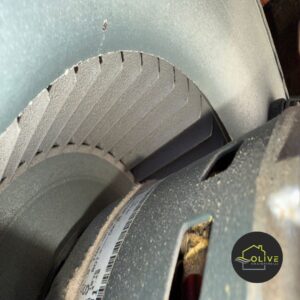 A close-up view of a blower wheel properly installed within an HVAC system, demonstrating a key component of professional HVAC installation.